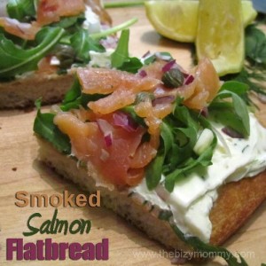 Smoked salmon flatbread with arugula, dill, lemon, capers, onions and cream cheese - Super easy and great for parties!